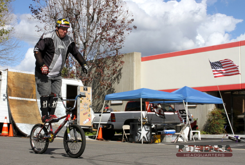 Standing BMX rider no hands