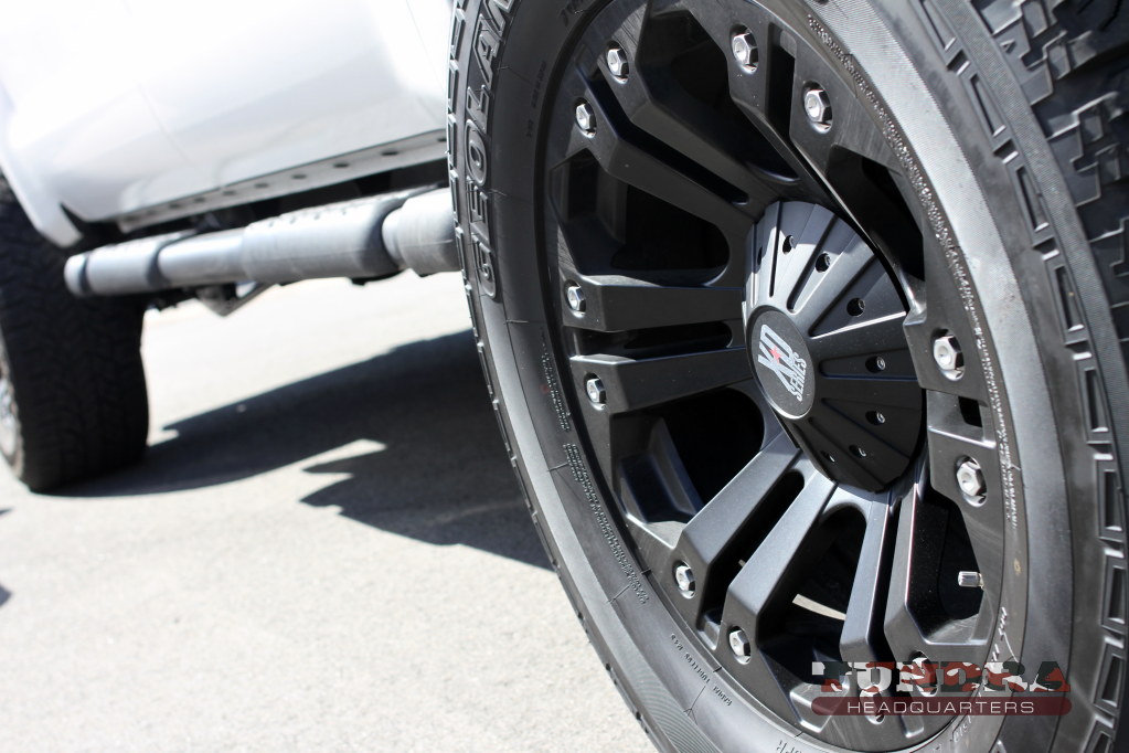 Lifted Tundra crew with blacked-out rims