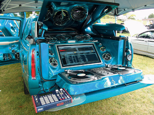 A truck bed full of speakers