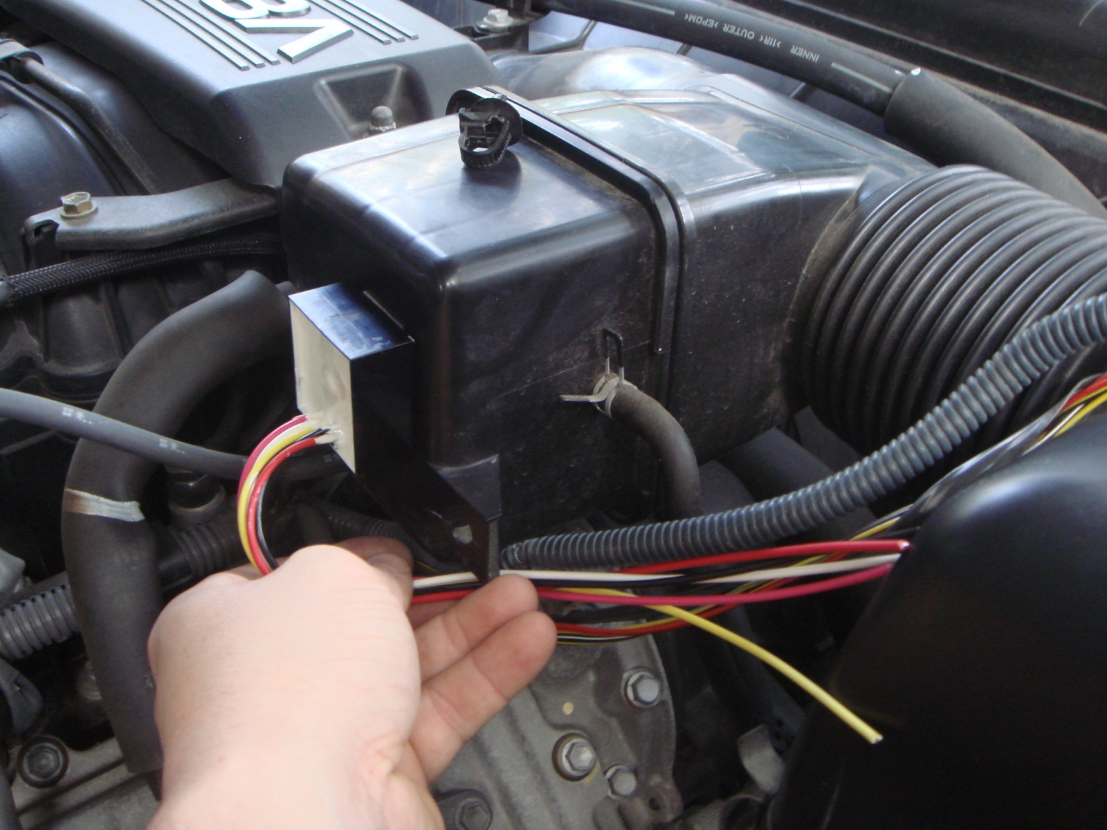 Installing-Air-Injection-System-Bypass-Module After install. the Air Injection System Bypass Module is nearly undetecable