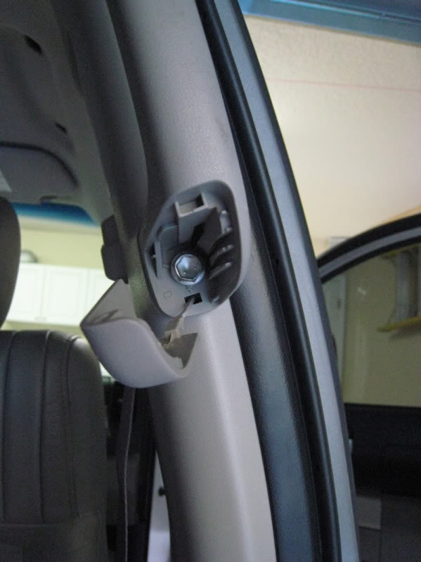 Remove the Upper Bolts from the B-Pillar Step 3: Remove the bolts located in the handles