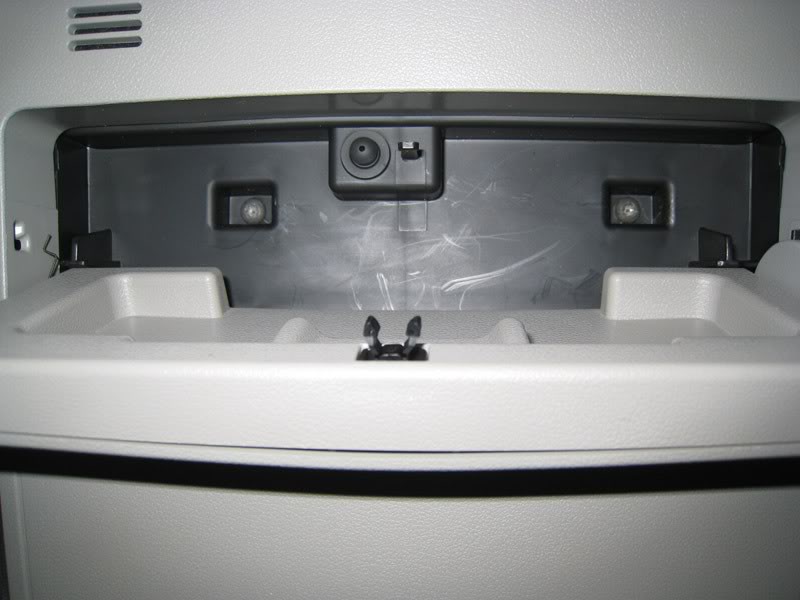 Remove the Screws in the Business Card Compartment Step 10: Remove the screws located in the business card compartment