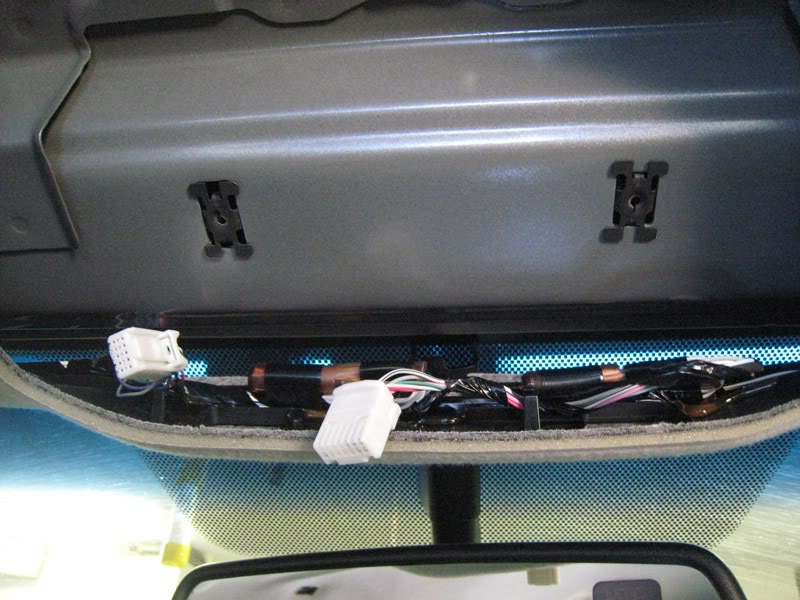 Unplug the Wiring Harness Step 12: Unplug the wiring harness and remove the overhead console
